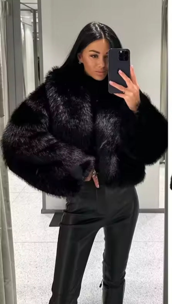 Manteau fausse fourure.