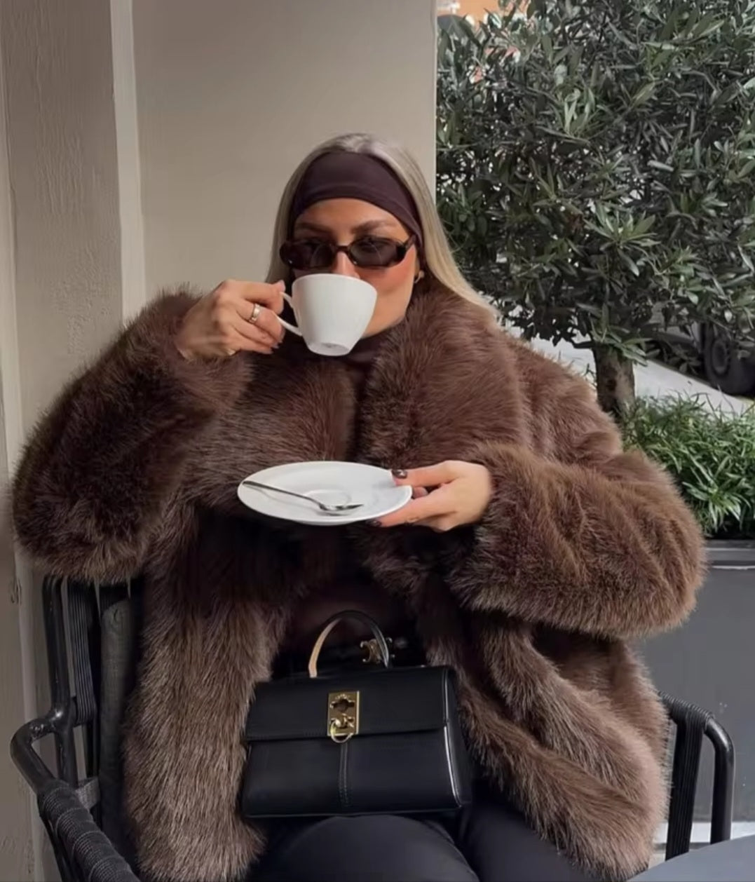 Manteau fausse fourure.