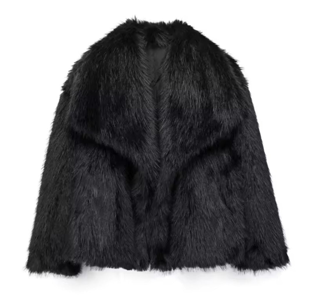 Manteau fausse fourure.